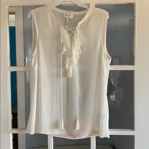 Tassel and ruffle front blouse